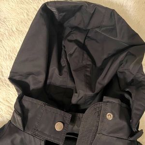 Water-resistant Removable hood zipper front Long sleeves 2 with zipper packets.